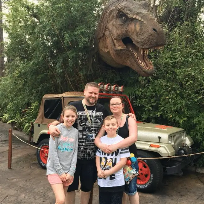 A family photo in the Jurassic Park area at islands of Adventure
