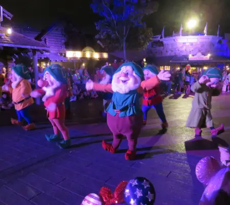 The Seven Dwarfs in the Christmas Parade at Magic Kingdom