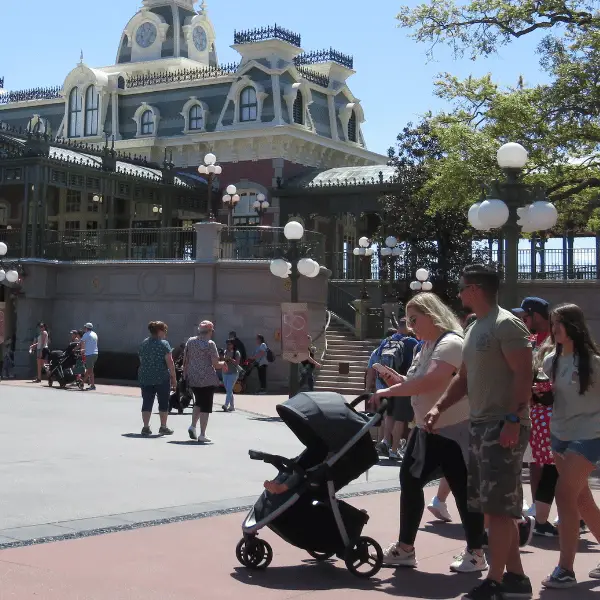 A family with a stroller in Magic Kingdom