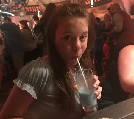 Where to Get Blue Milk in Disney World - My daughter trying a Blue Bantha at Oga's Cantina