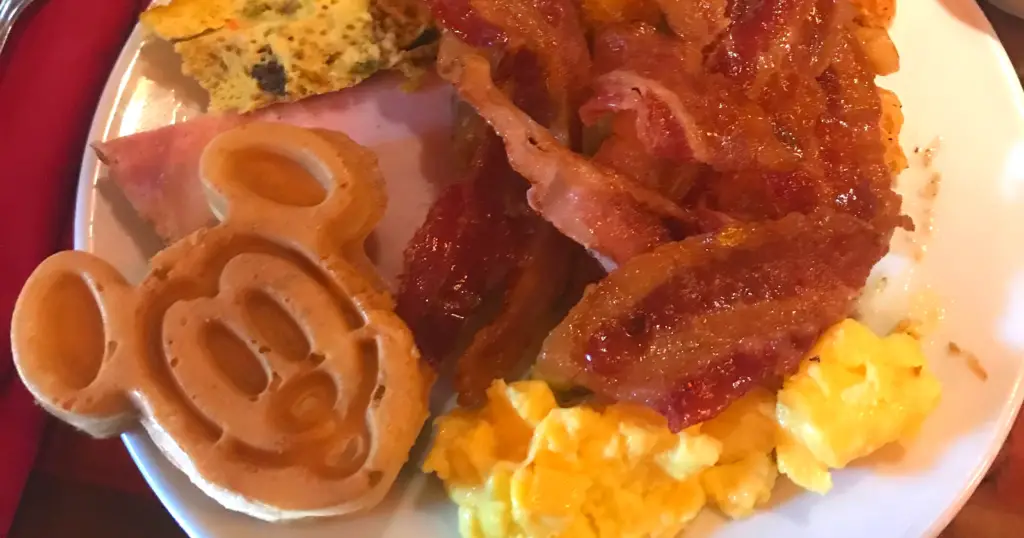A Disney World breakfast with a Mickey Waffle