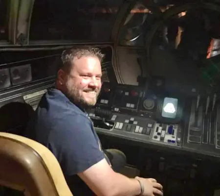 Me sitting in Han Solo's seat and very much enjoying it.