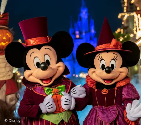 Mickey and Minnie Mouse in their Halloween costumes