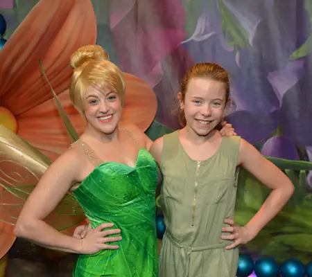 Getting a photo with Tinker Bell in Magic Kingdom